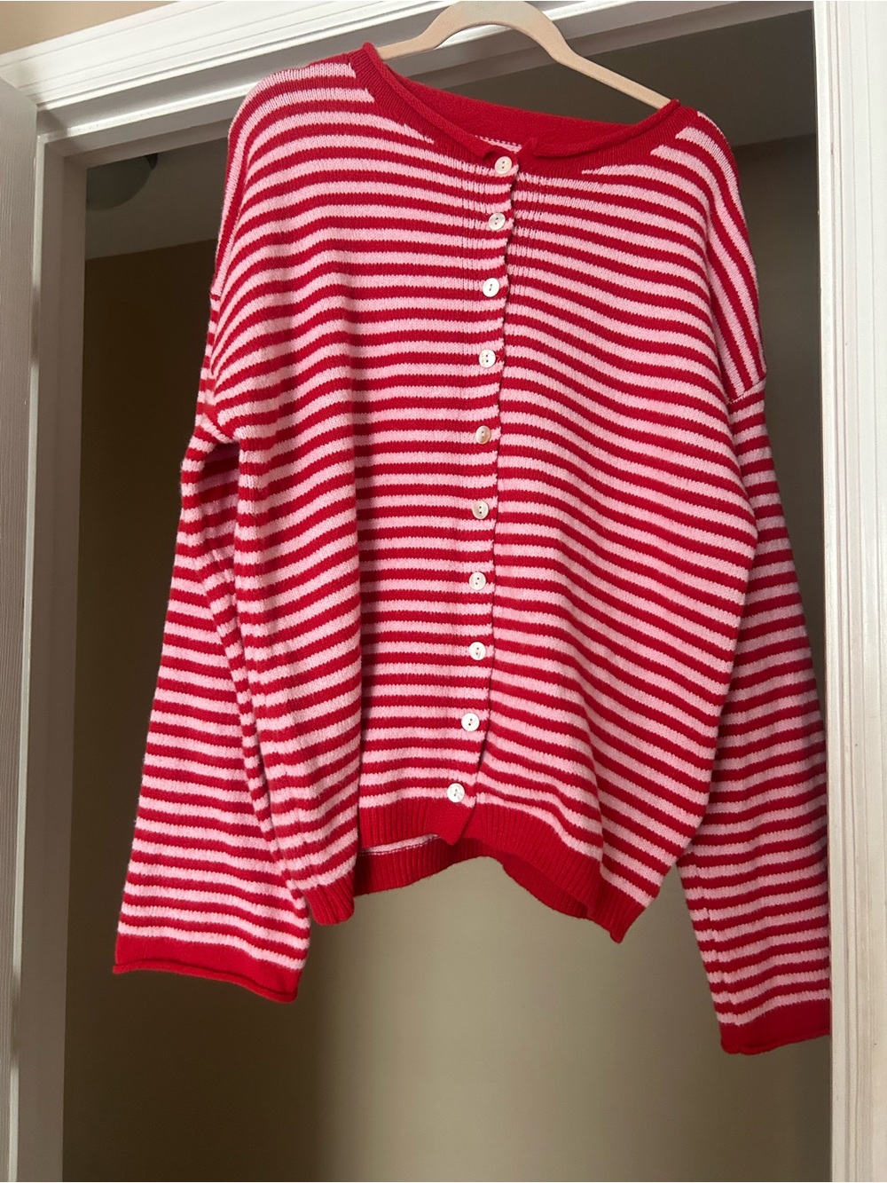 Striped Red and pink- Button sweater.No tag, fits like a Large.soft and stretchy